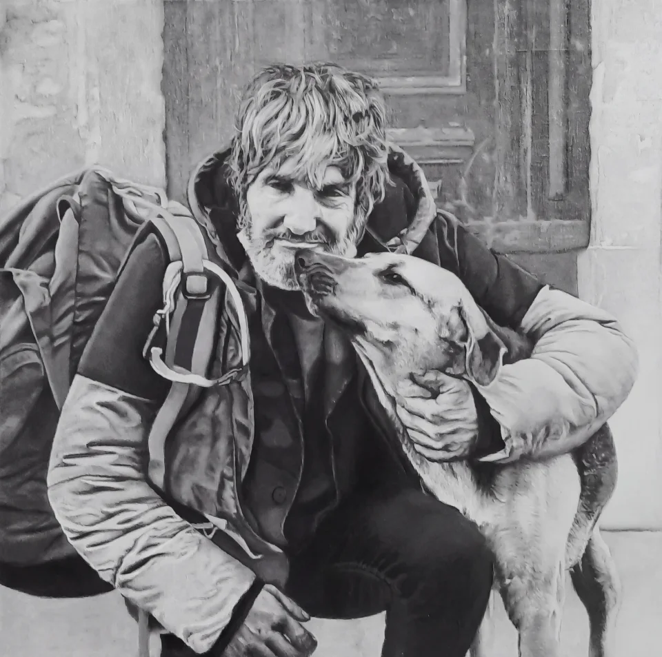 Homme au sac a dos et son chien